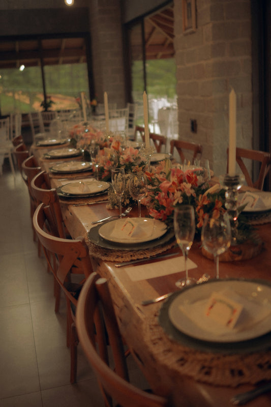 Elegant long dining table set for a formal event.